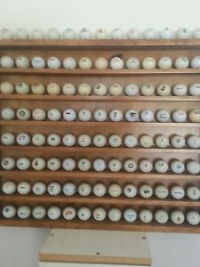 400 logoed golf balls from Early '60 - '00 plus 4 matching display cases