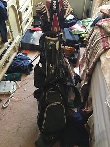 Ping g25 irons and driver fairway woods bag and putter