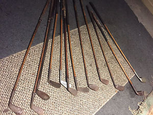 12 Antique Gold Clubs Wooden Shafts, Iron and Wooden Heads